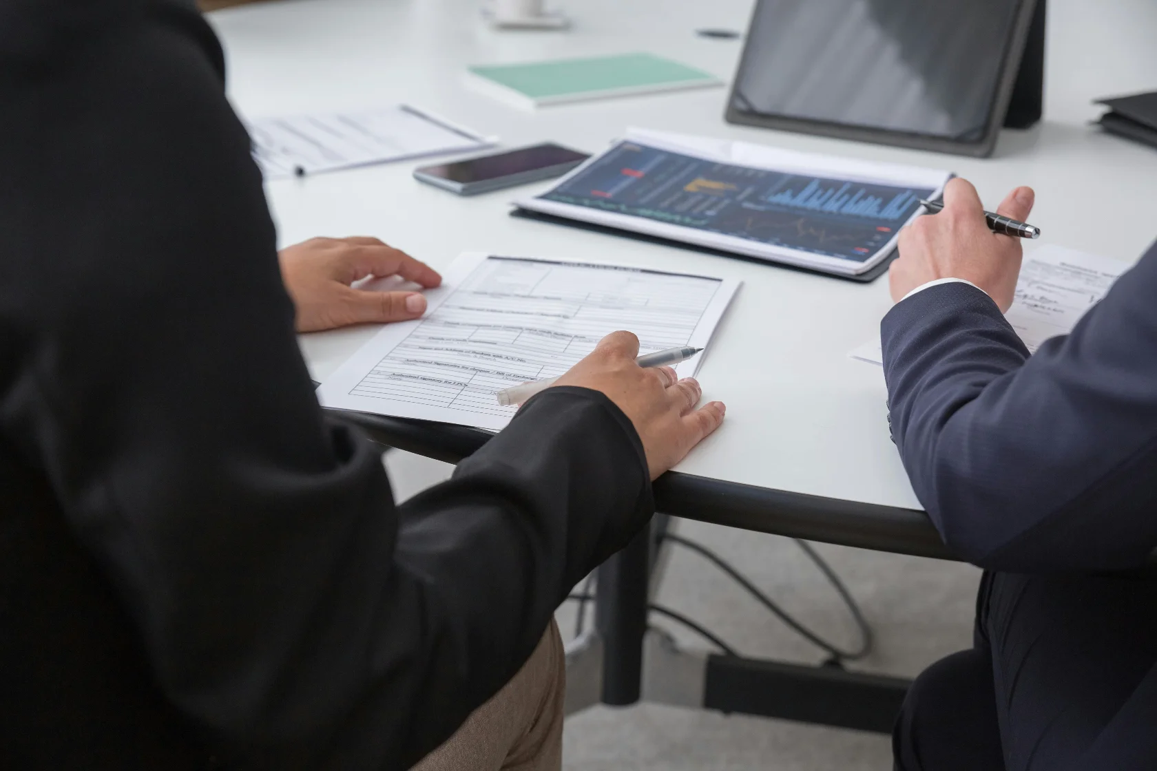Financial advisors creating a contingency budget for a client